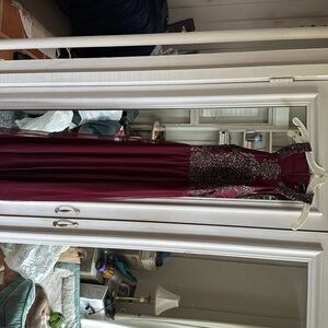Bridal dress, size 13. Maroon with black and silver detailing
